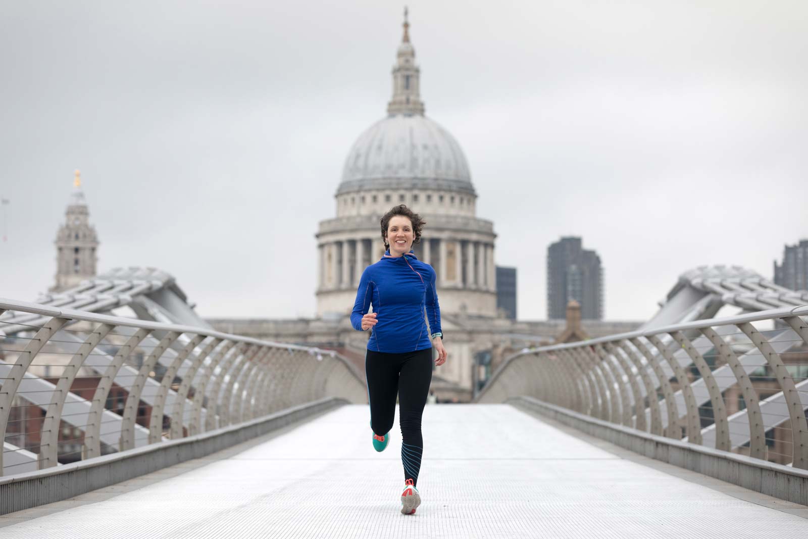 Running across Millenium Bidge Fitness Photography Croydon London