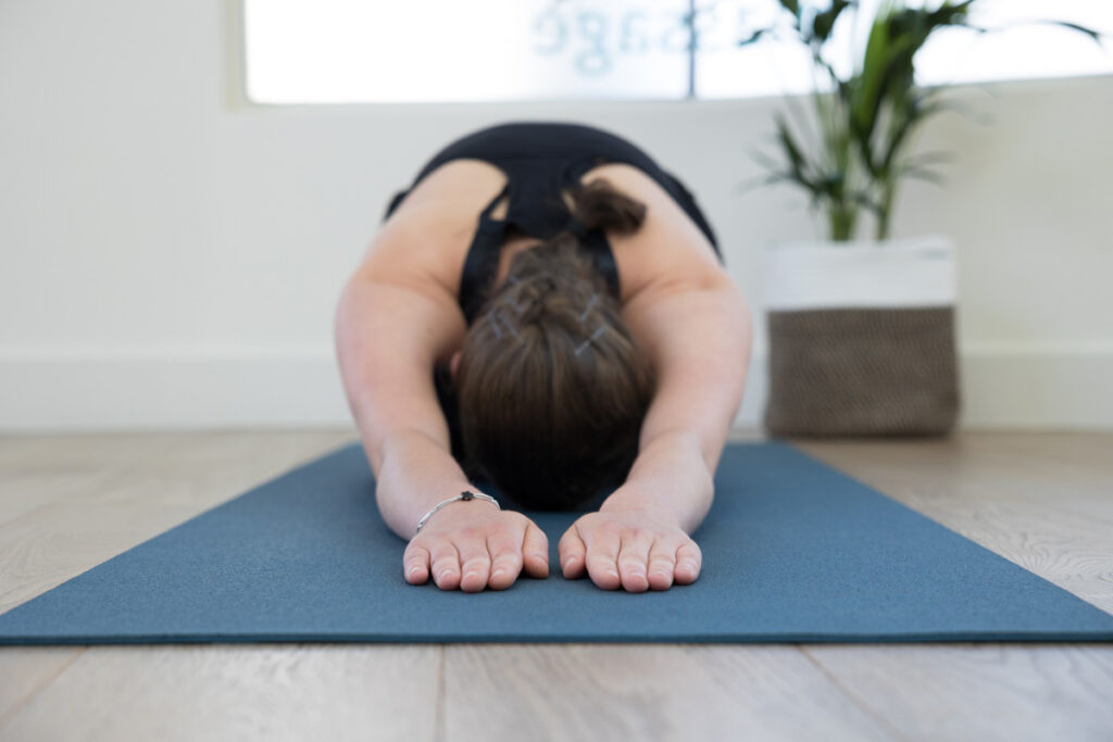 Childs pose during yoga for Health & Wellness Photography London